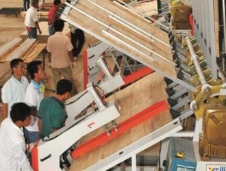 海南橡胶下属12家工厂年产橡胶木板材达30万立方米